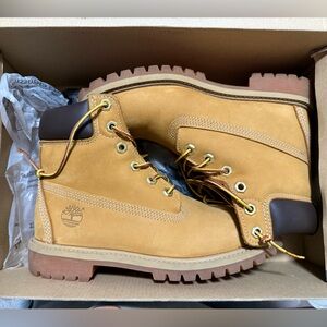 Timberland Tan and Brown High-Top Boots with Rugged Sole